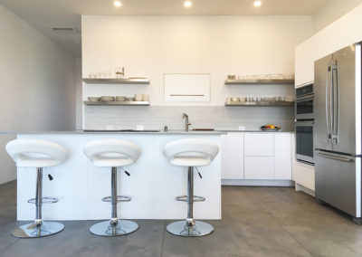 White Kitchen With Very Thin Grey Countertops